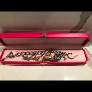 Never worn Juicy Couture Charm bracelet.
